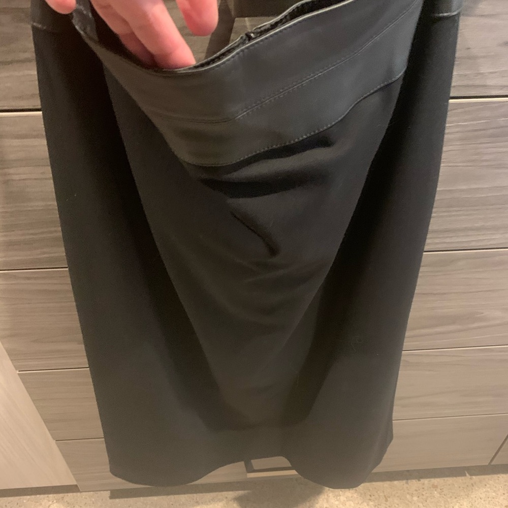 Black below the knee skirt with leather trim